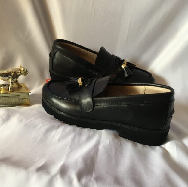 TopNotch shoes world logo